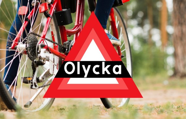 olyckstriangel och cyklist